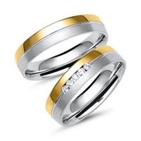 alianzas de oro amarillo y blanco con 5 diamantes