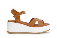 sandalias cruzadas con cuna en la base tan
