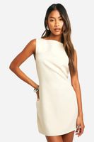 vestido mini micro acampanado con escote oblicuo beige