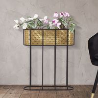macetero de metal dorado con base negra cm 60x20x70