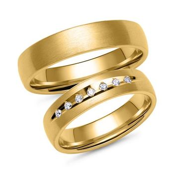 Alianzas de oro con 7 diamantes