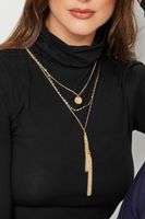 juego 3 collares dorados con borlas