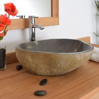 lavabo independiente en piedra de rio
