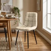 silla con patas de metal y asiento en terciopelo blanco crema