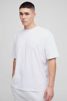 camiseta oversize con bordado de firma bm y cuello de caja blanco
