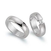 alianzas 8 quilates oro blanco con diamante