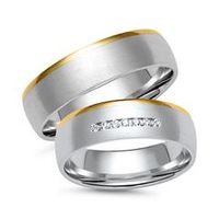 alianzas de oro blanco y amarillo con 7 diamantes