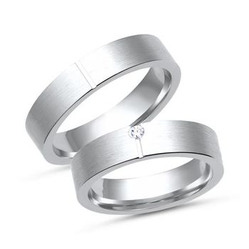 Alianzas 8 quilates oro blanco con diamante