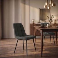 silla con patas de metal y asiento en tela gris oscuro