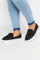 zapatillas negras vaqueras con lazo