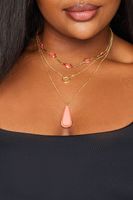 collar dorado triple altura con adornos rosa coral