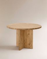 mesa de comedor redonda de madera maciza en tono medio de o110x75cm