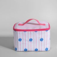 bolsa portaalimentos beige con motivos azules y rojos