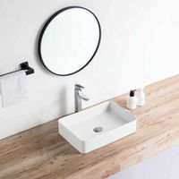 lavabo blanco brillante sobre encimera ceramico rista 50 x 34 cm