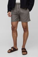 pantalon corto holgado de mezcla de lino con cintura elastica beige