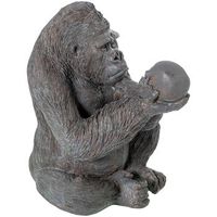 figura gorila dorado y blanco