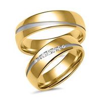 alianzas en oro amarillo y blanco con 7 diamantes