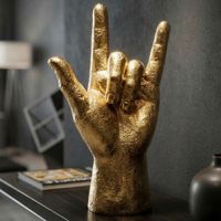 estatuilla en forma de mano en resina dorada cm 145x7x23