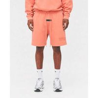 fear of god short essentials pf22 shorts coral para hombre