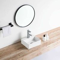 lavabo blanco brillante sobre encimera ceramico salta 33 x 29 cm