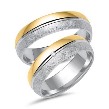 Alianzas de oro blanco y amarillo con diamante
