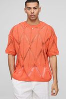 camiseta oversize de punto con estampado abstracto naranja