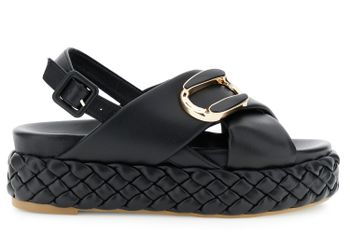 sandalias cruzadas con fondo trenzado y complemento. black
