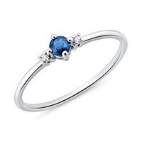 anillo de mujer en oro blanco de 14 quilates con zafiro y diamantes