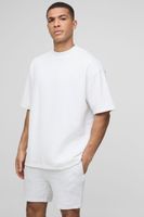 camiseta oversize gruesa con cuello extendido y firma bm blanco