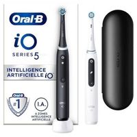 cepillos de dientes electricos en blanco y negro 2 cabezales