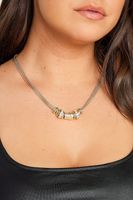 collar dorado multicadena con dijes