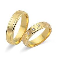 alianzas 18 quilates oro amarillo 3 diamantes