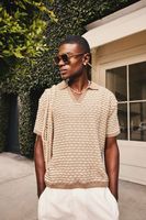 polo oversize recto de punto texturizado con rayas beige