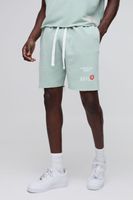 pantalon corto holgado con lavado a la piedra y estampado verde