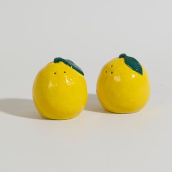 Salero y pimentero en forma de limones de gres
