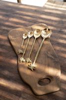 cuchara de laton en dorado 22x4x1 cm