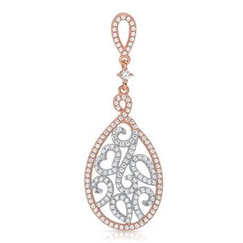 Colgante de plata dorada con piedras blancas