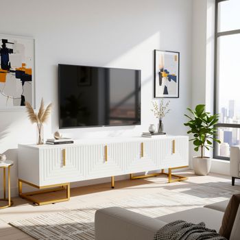 Mueble TV blanco con patas doradas y frentes esculpidos.