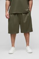 pantalon corto plus oversize de scuba con caida en la entrepierna y alforza verde