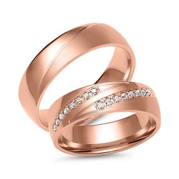 Alianzas de oro rosa con 16 diamantes