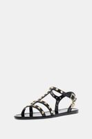 sandalias jelly con tachuelas