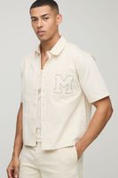 camisa oversize recta de manga corta con bordado cream