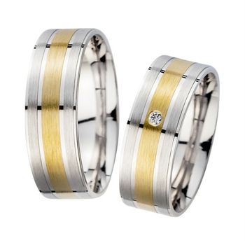 Alianzas oro amarillo y blanco con diamante ancho 7 mm