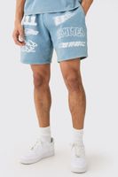 pantalon corto holgado con lavado a la piedra y estampado de motociclismo en relieve azul