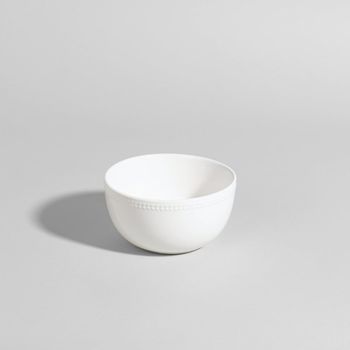 Bol de cerámica blanca con ribete en relieve