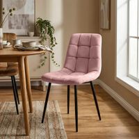 silla con patas de metal y asiento en terciopelo rosado