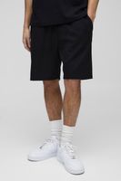 pantalon corto holgado de tela gofre con bordado man negro