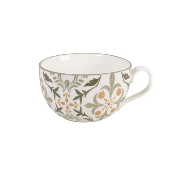 Taza de cerámica blanca y flores verdes y ocres
