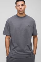 camiseta oversize con cuello de caja y estampado homme gris