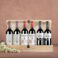 caja de madera con 6 vinos tintos rioja vina salceda lan d-12 y ribera del duero 409